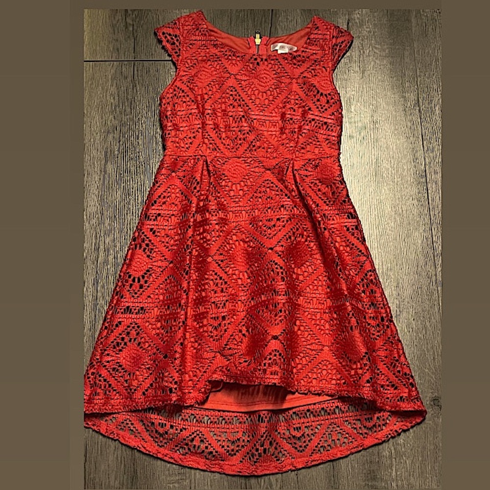 A pink xhilaration dress.